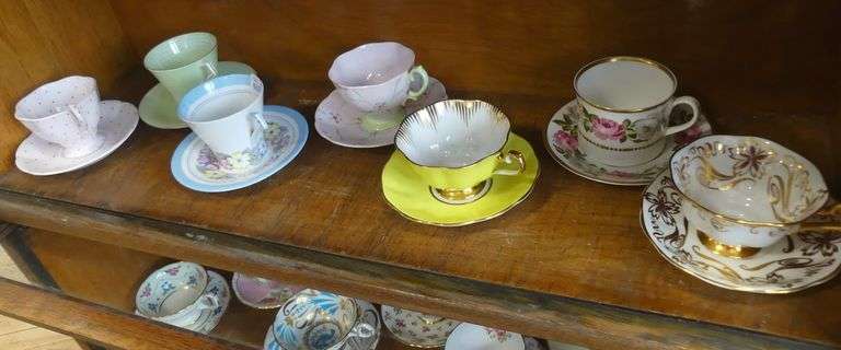 14 CUPS AND SAUCERS