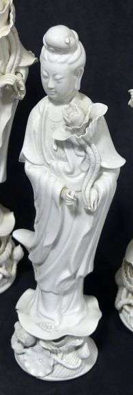 THREE "GUAN YIN" BLANC-DE-CHINE PORCELAIN FIGURINES