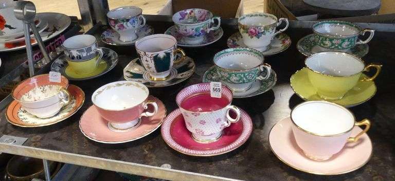 TWELVE ENGLISH CUPS AND SAUCERS