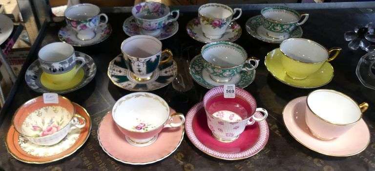 TWELVE ENGLISH CUPS AND SAUCERS