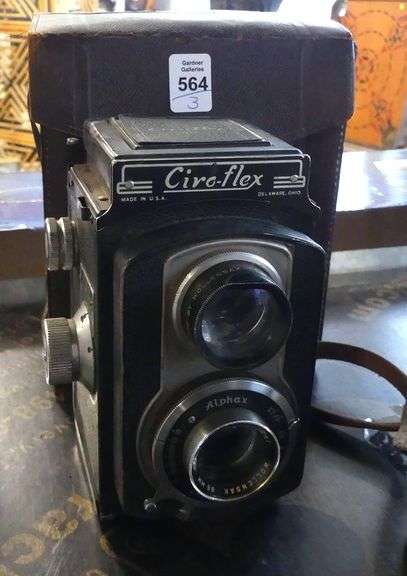 TWO CAMERAS AND LENS