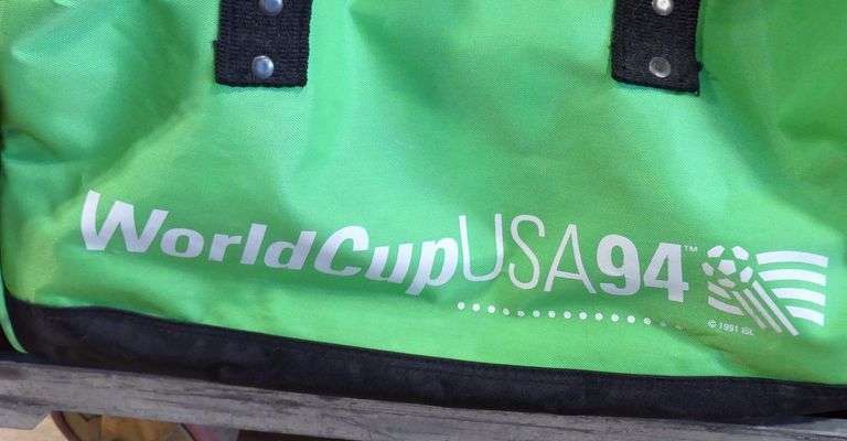 DUFFEL BAG AND SPORTS COLLECTIBLES