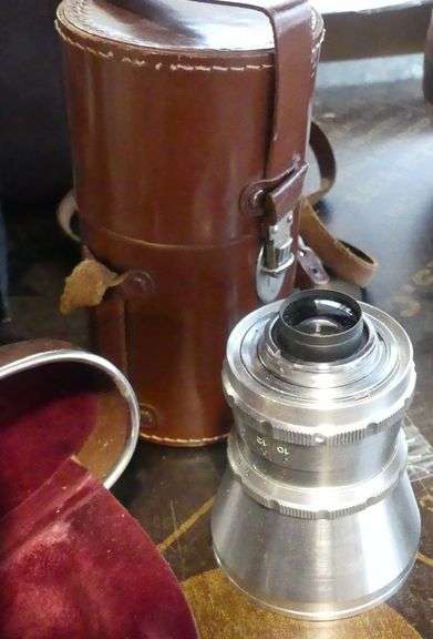 TWO CAMERAS AND LENS