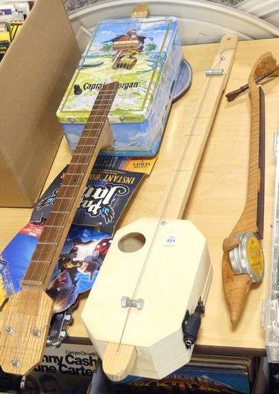 THREE HOMEMADE INSTRUMENTS AND WALL ART