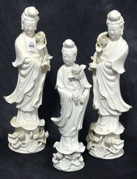 THREE "GUAN YIN" BLANC-DE-CHINE PORCELAIN FIGURINES