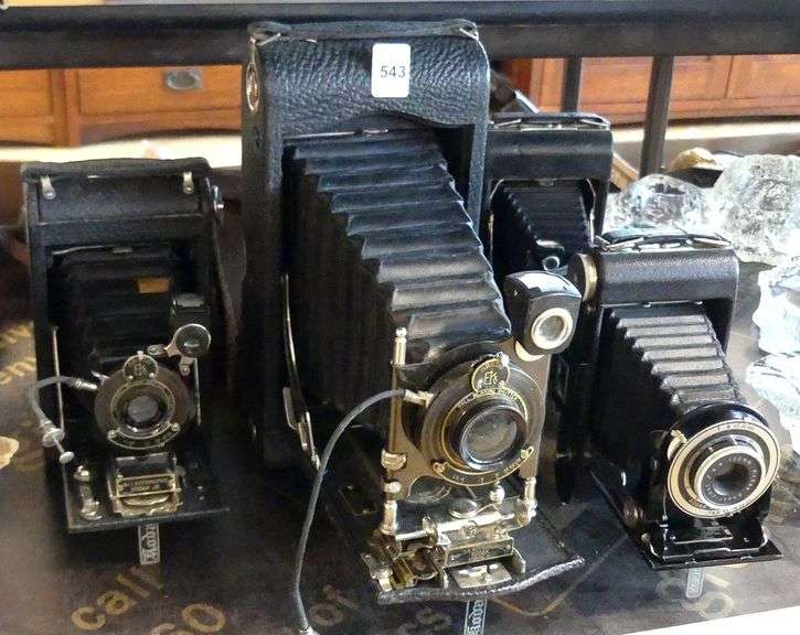 FOUR ANTIQUE BELLOWS CAMERAS