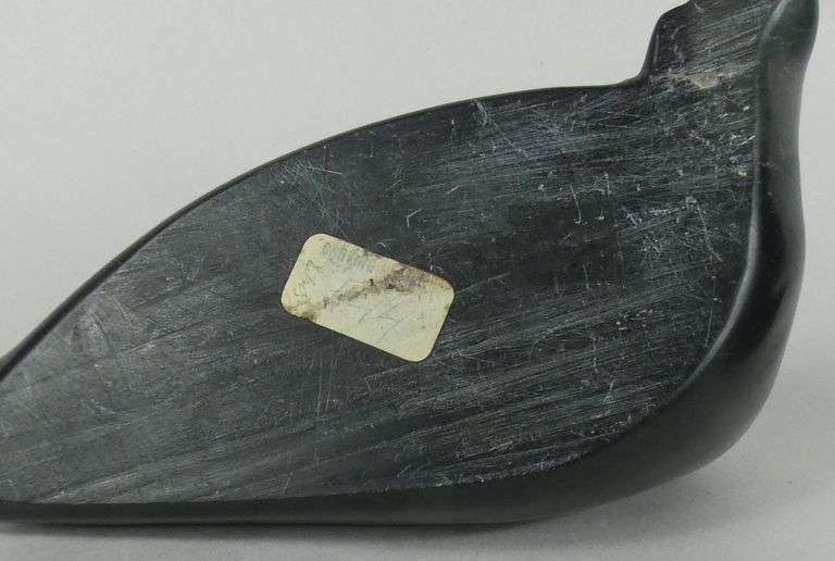 FOUR INUIT STONE CARVINGS