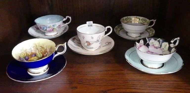 FIVE ENGLISH CUPS AND SAUCERS