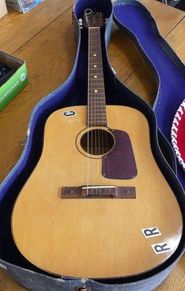 ACOUSTIC GUITAR AND SOMBRERO