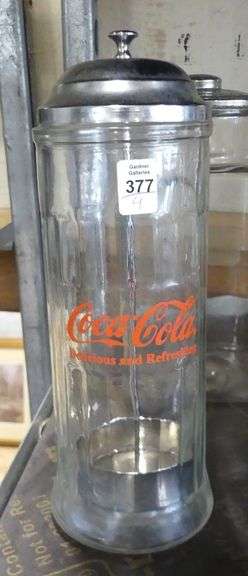 TWO JARS, OIL LAMP AND CANDELABRUM