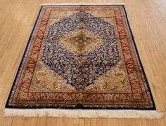 SIGNED PERSIAN SILK RUG