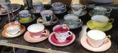 TWELVE ENGLISH CUPS AND SAUCERS