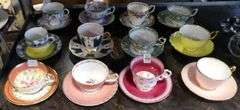 TWELVE ENGLISH CUPS AND SAUCERS
