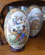 THREE CHINESE PORCELAIN "EGG" FIGURINES