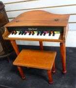 TABLE-TOP CABINET AND CHILD'S PIANO TOY