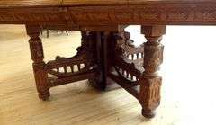 19TH CENTURY CARVED OAK DINING TABLE
