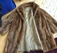 FOUR VINTAGE FUR COATS