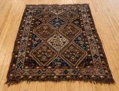 ANTIQUE PERSIAN RUG