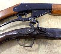 TWO TOY RIFLES