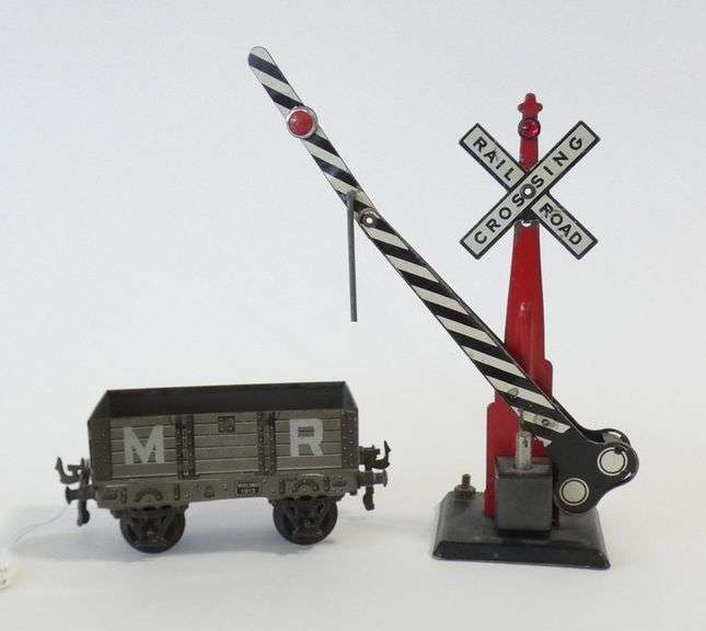 FOUR VINTAGE/ANTIQUE METAL TOYS