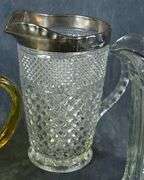 THREE GLASS PITCHERS