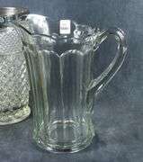 THREE GLASS PITCHERS