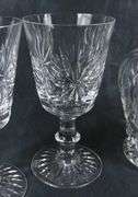 CRYSTAL DECANTER & SET OF FOUR GLASSES