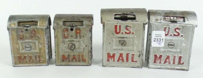 4 CAST IRON COIN BANKS