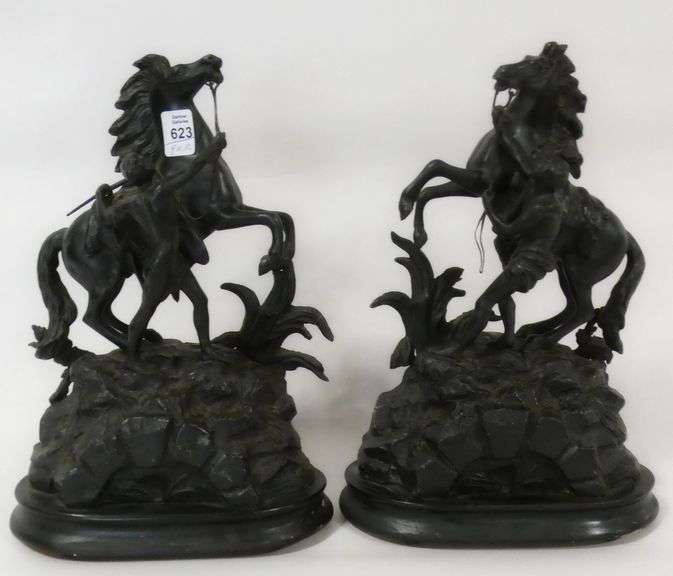 PAIR OF CAST METAL "MARLEY HORSE" SCULPTURES