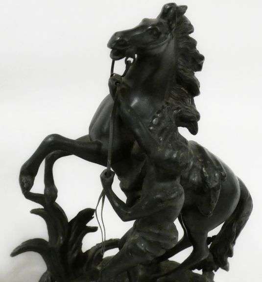 PAIR OF CAST METAL "MARLEY HORSE" SCULPTURES