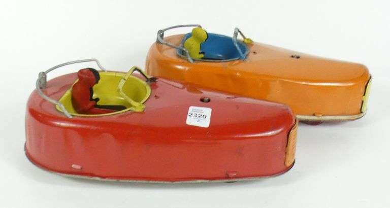 2 TIN CLOCKWORK TOYS