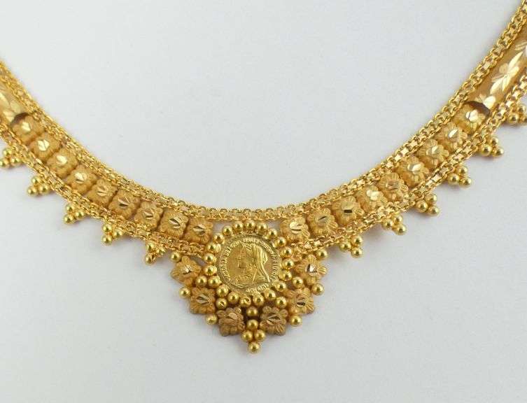 GOLD NECKLACE WITH "COINS"