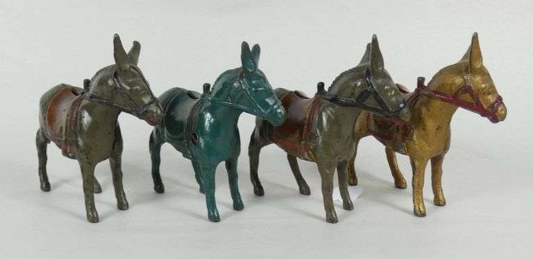 4 "DONKEY" CAST IRON BANKS