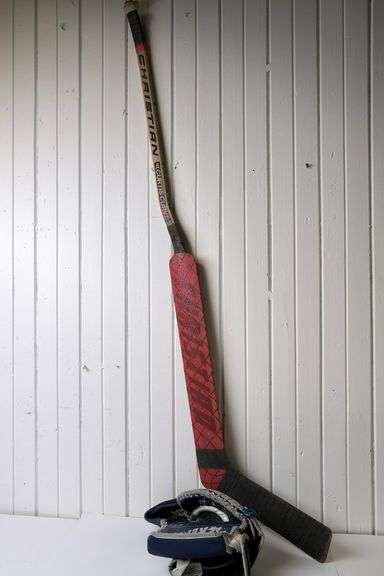 HOCKEY GOALIE STICK AND GLOVE