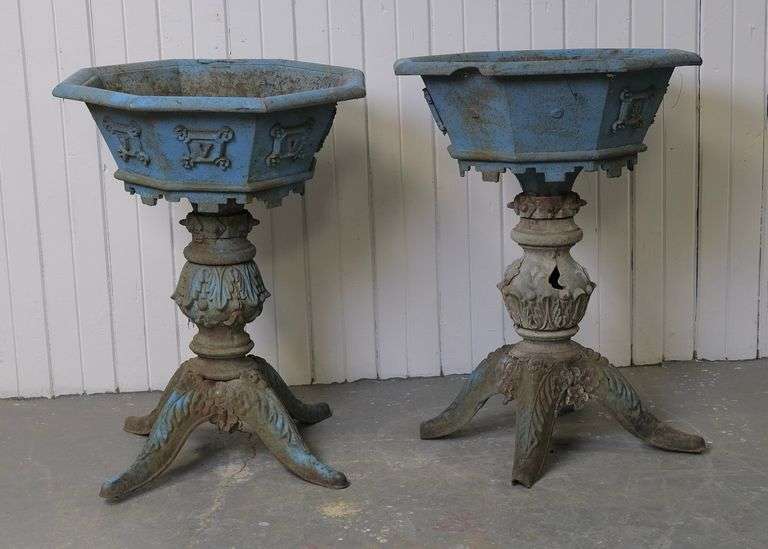 PAIR OF CAST IRON URNS