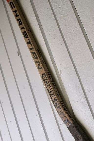 HOCKEY GOALIE STICK AND GLOVE