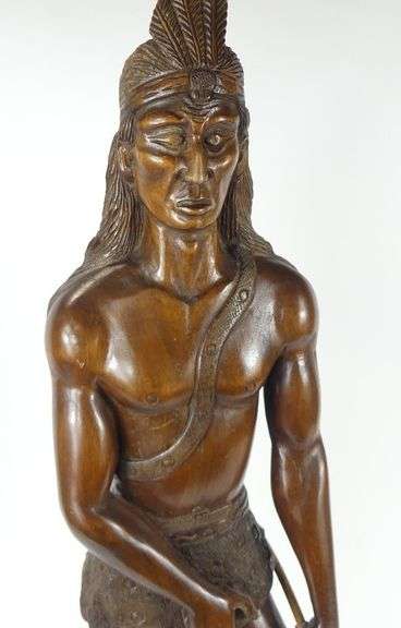HAND-CARVED WOOD FIGURE