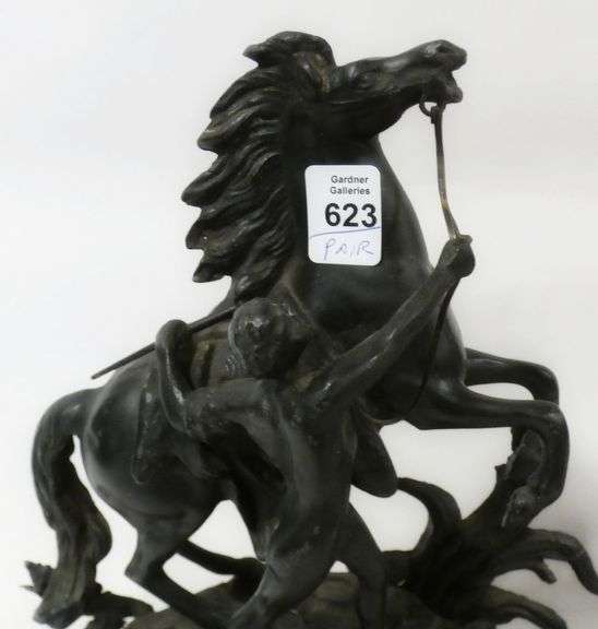 PAIR OF CAST METAL "MARLEY HORSE" SCULPTURES