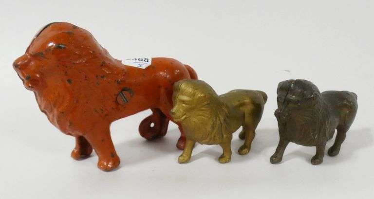 5 CAST IRON "LION" BANKS