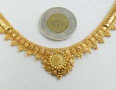 GOLD NECKLACE WITH "COINS"