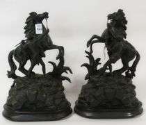 PAIR OF CAST METAL "MARLEY HORSE" SCULPTURES