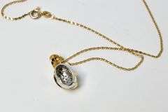 14K DIAMOND PENDANT AND CHAIN