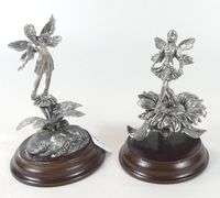 TWO MERLIN FINE ART FIGURINES