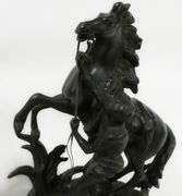PAIR OF CAST METAL "MARLEY HORSE" SCULPTURES
