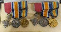 TWO SETS OF WW1 SERVICE MEDALS
