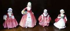 FOUR ROYAL DOULTON FIGURINES
