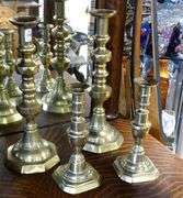 TWO PAIRS OF ANTIQUE BRASS CANDLESTICKS