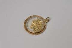 GOLD FLAKE PENDANT