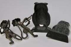 BOOKENDS AND CANDLESTICKS