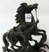 PAIR OF CAST METAL "MARLEY HORSE" SCULPTURES